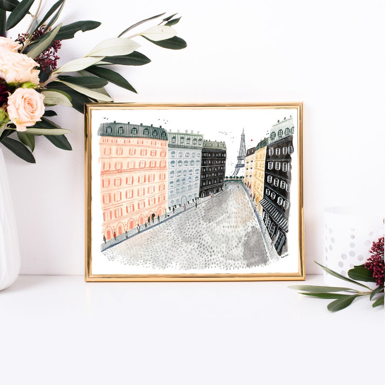May include: A watercolor painting of a Parisian street scene with buildings on either side and the Eiffel Tower in the distance. The buildings are painted in shades of pink, gray, and black. The street is cobblestone and there are people walking on it.