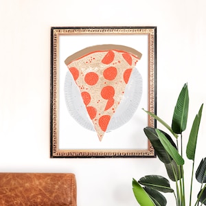 May include: A framed illustration of a slice of pepperoni pizza on a white plate. The pizza is drawn in a cartoon style with red pepperoni, white cheese, and a brown crust.