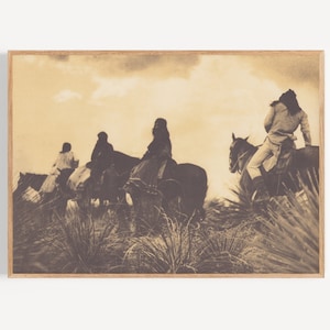 May include: A sepia-toned photograph of four people riding horses through a field of tall grass. The riders are silhouetted against a cloudy sky.