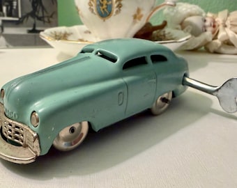 Coche de cuerda antiguo SCHUCO Mirakocar, zona de EE. UU., Alemania, en funcionamiento con llave original.