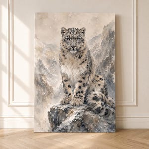 May include: A vertical rectangular wall art print featuring a watercolour painting of a snow leopard sitting on a rocky outcrop. The leopard has a white and grey coat with black spots. The background depicts snowy mountain peaks in muted tones.
