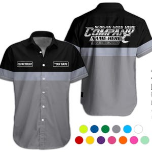 Peut inclure: Une chemise de travail à manches courtes avec une partie supérieure noire, une partie inférieure grise et une bande gris clair. La chemise porte les inscriptions "DEPARTMENT" et "YOUR NAME" sur le devant, et "SLOGAN GOES HERE", "COMPANY NAME HERE" et un numéro de téléphone au dos.