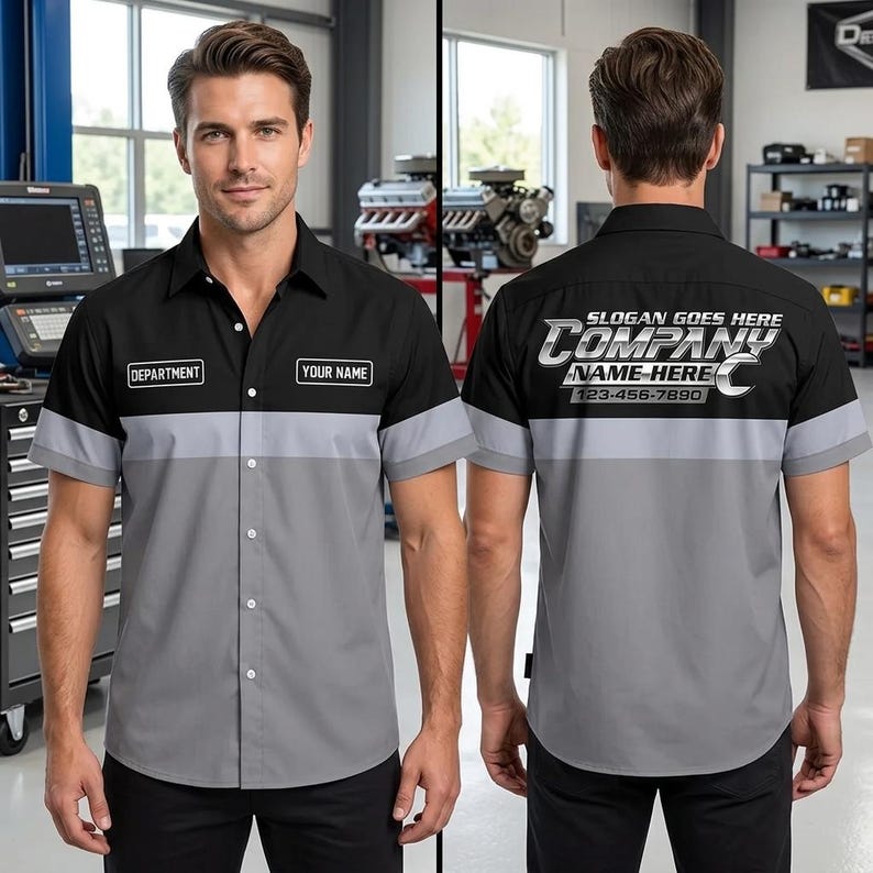 May include: A short-sleeve button-down work shirt featuring a black upper section and a gray lower section. The front includes rectangular patches labeled DEPARTMENT and YOUR NAME. The back displays the text SLOGAN GOES HERE COMPANY NAME HERE.