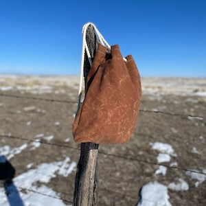 Sac à dos en toile cirée avec cordon de serrage