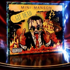 May include: Album cover for "Git Dead" by Mini Manson. The artwork features a cartoonish figure with sunglasses, a suit, and a red tie, giving the middle finger. Flames and the words "Welcome to Fabulous Las Vegas Nevada" are also visible.
