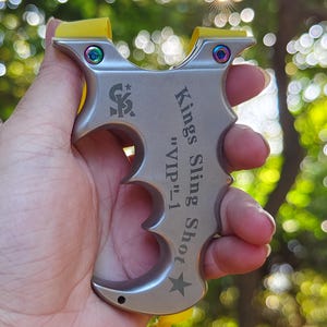 Xenomorph-X12 Dual-Grip Slingshot – CNC Stainless Steel, Alien-Inspired Design with Precision Control