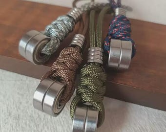 Hand-Carved Mechanical Roller Titanium Steel Lanyard Bead | EDC Knife Charm, Slingshot Pendant, Paracord Keychain Accessory