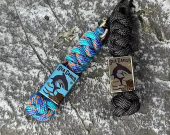 Haaienkoordkraal, gemaakt van titaniumlegering, inclusief gratis paracordsleutelkoord.