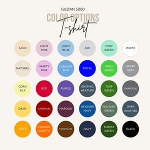 May include: A Gildan 5000 color options chart for a t-shirt, featuring thirty circular swatches in various colors including sand, pink, blue, ash, green, white, yellow, red, purple, grey, maroon, navy, brown, orange, and black with labels.