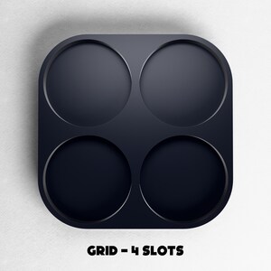 May include: A dark navy blue grid with four circular slots. The grid has rounded corners and is set against a white background. The text "GRID - 4 SLOTS" is printed in black at the bottom of the image.