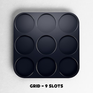May include: A dark navy blue grid with nine circular slots. The grid is square with rounded corners. The text "GRID - 9 SLOTS" is printed in bold white letters at the bottom of the image.