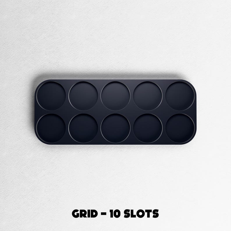 May include: A dark navy blue grid with ten circular slots, perfect for organizing small items. The text "GRID - 10 SLOTS" is printed in black at the bottom of the image. The grid has rounded corners and is set against a white background.