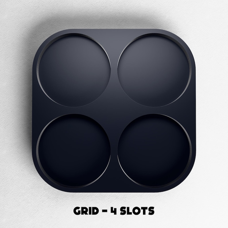 May include: A dark navy blue grid with four circular slots. The grid has rounded corners and is set against a white background. The text "GRID - 4 SLOTS" is displayed in black at the bottom of the image.