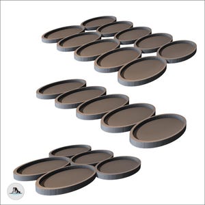 May include: A collection of oval-shaped, brown trays with gray rims, arranged in multiple rows. The trays are empty and appear to be made of a solid material. The image is set against a white background.