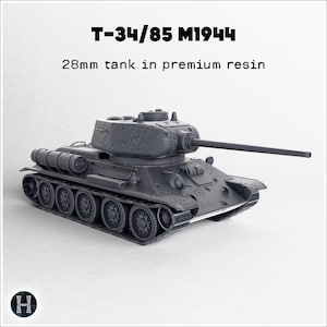 May include: A gray T-34/85 M1944 tank model made of premium resin. The model is 28mm in size and features a long gun barrel, detailed tracks, and a rotating turret. The text "T-34/85 M1944" and "28mm tank in premium resin" are visible.