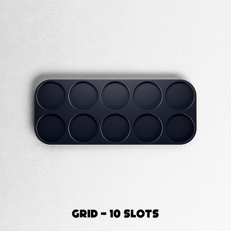 May include: A dark navy blue grid with ten circular slots. The grid is rectangular with rounded corners. The text "GRID - 10 SLOTS" is printed in black at the bottom of the image.