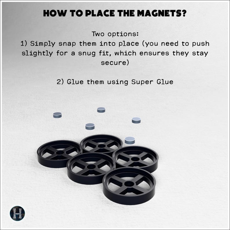May include: Image showing instructions on how to place magnets. The text reads "HOW TO PLACE THE MAGNETS?" with two options: snap into place or glue. Several black, wheel-shaped objects and small gray magnets are visible.