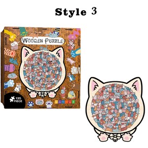 Puede incluir: Un rompecabezas de madera con forma de cabeza de gato, con una colorida ilustraci&oacute;n de numerosos gatos. La caja del rompecabezas muestra el texto "Wooden Puzzle" y "135 Piece". Una actividad divertida para todas las edades.