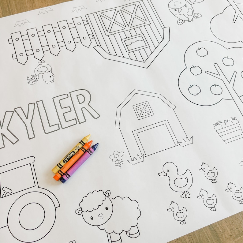 May include: A black and white colouring page featuring a farm scene with a barn, a fence, a tree, a tractor, a sheep, ducks, and the name "KYLER". Crayola crayons are included.