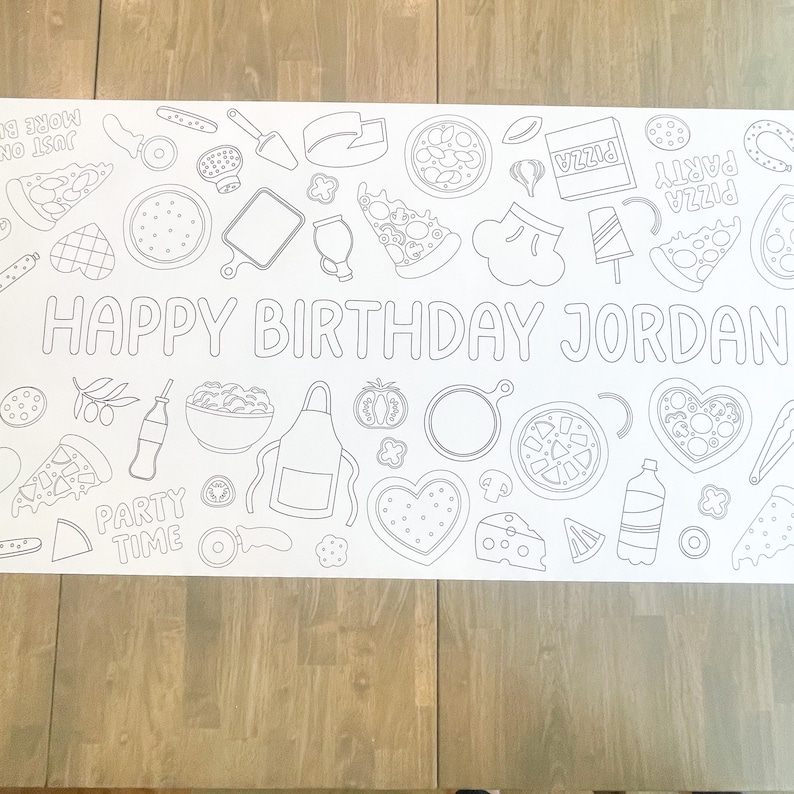 White paper table runner with a black outline design of pizza-themed illustrations. The words "HAPPY BIRTHDAY JORDAN" are prominently displayed. Includes pizza slices, pizza boxes, and other party-related graphics.