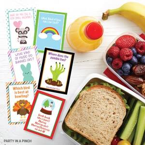 May include: A set of colorful cards with jokes and puns on them. The cards feature illustrations of a panda, a rainbow, a bunny, a zombie hand, a turkey, a snowman, and a Christmas tree. The cards are perfect for a party or a fun activity.