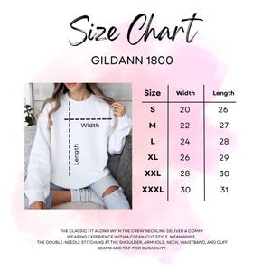 May include: A white Gildan 1800 sweatshirt size chart. The chart lists sizes S to XXXL with corresponding width and length measurements in inches. The text also describes the classic fit, crew neckline, and double-needle stitching.