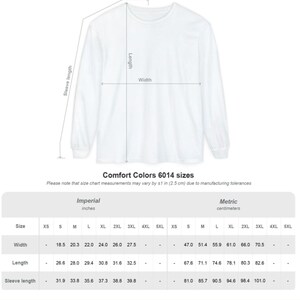 May include: White long-sleeve shirt with measurements for width, length, and sleeve length. The size chart includes imperial measurements in inches and metric measurements in centimeters for Comfort Colors 6014 sizes.