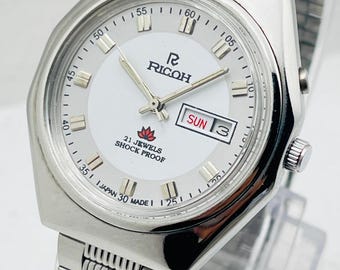 Vintage Seiko 5 Sports 100m Automatic 23jewels Blue Dial Date/day