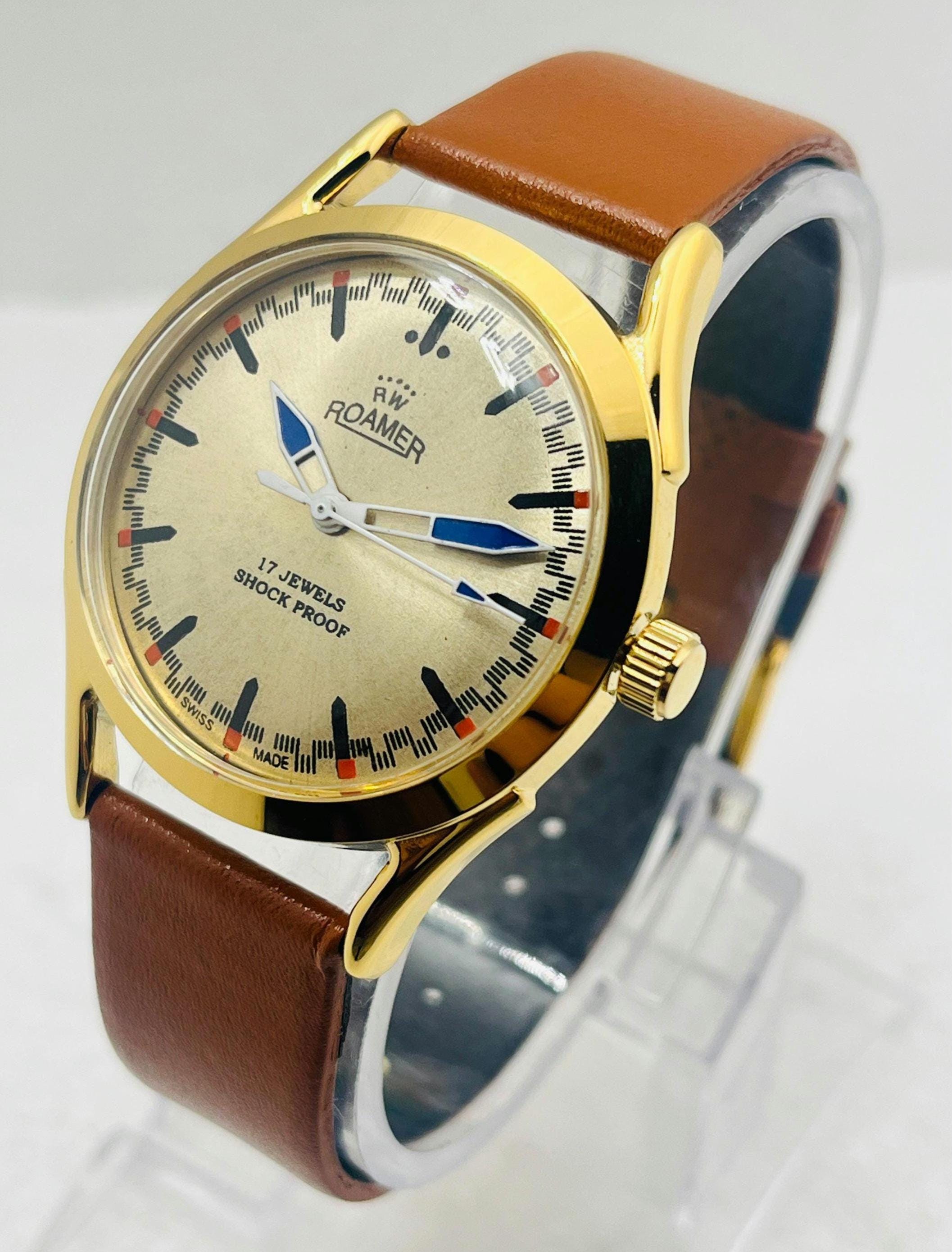 Vintage Roamer Silver Face Golden Case Mechanical Hand Winding 17  Vintage 1979 Roamer Manual Mens Gold Watch W/Leather Strap & Gold accents main image 1