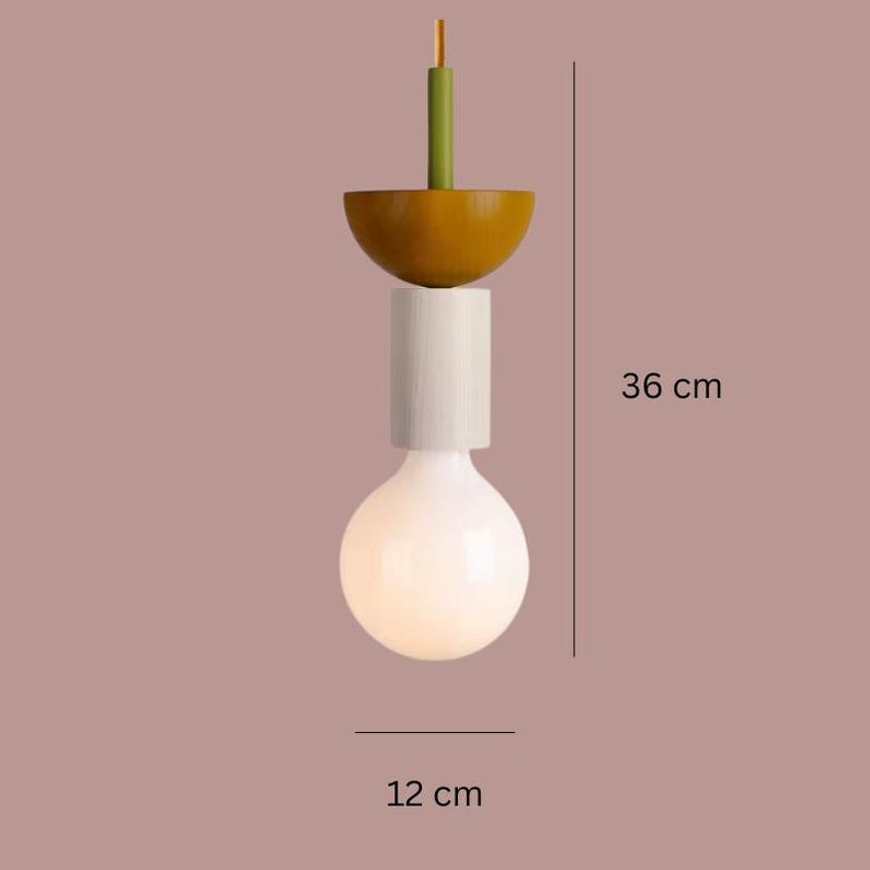May include: A modern pendant light with a white bulb, a white cylindrical section, and a mustard-yellow bowl-shaped top. The light is 14 inches tall and 4.7 inches wide. The top section is green and the cord is yellow.