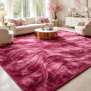 Handgetuft donkerroze vloerkleed, modern golvend pluche tapijt