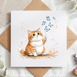 May include: A square greeting card featuring a watercolor illustration of a fluffy orange and white tabby cat sitting and reaching up with one paw toward a cluster of small, light blue butterflies floating in the air above its head.