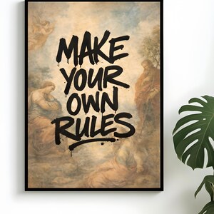 Könnte beinhalten: Gerahmter Kunstdruck mit dem Text "MAKE YOUR OWN RULES" in schwarzer, tropfender Schrift. Der Hintergrund zeigt ein klassisches Gemälde mit Figuren in gedämpften Beige-, Braun- und Blautönen.