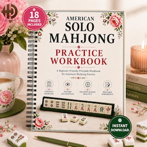 May include: A spiral-bound American Solo Mahjong practice workbook with a cream cover featuring floral illustrations, the title text, and four icons for strategy, pattern, decision-making, and worksheets. A rack of Mahjong tiles is displayed.