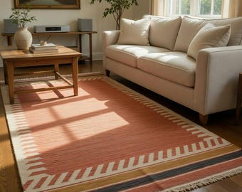 Handgeweven oranje kelimtapijt | Wollen tapijt met geometrische rand | Modern platgeweven vloerkleed
