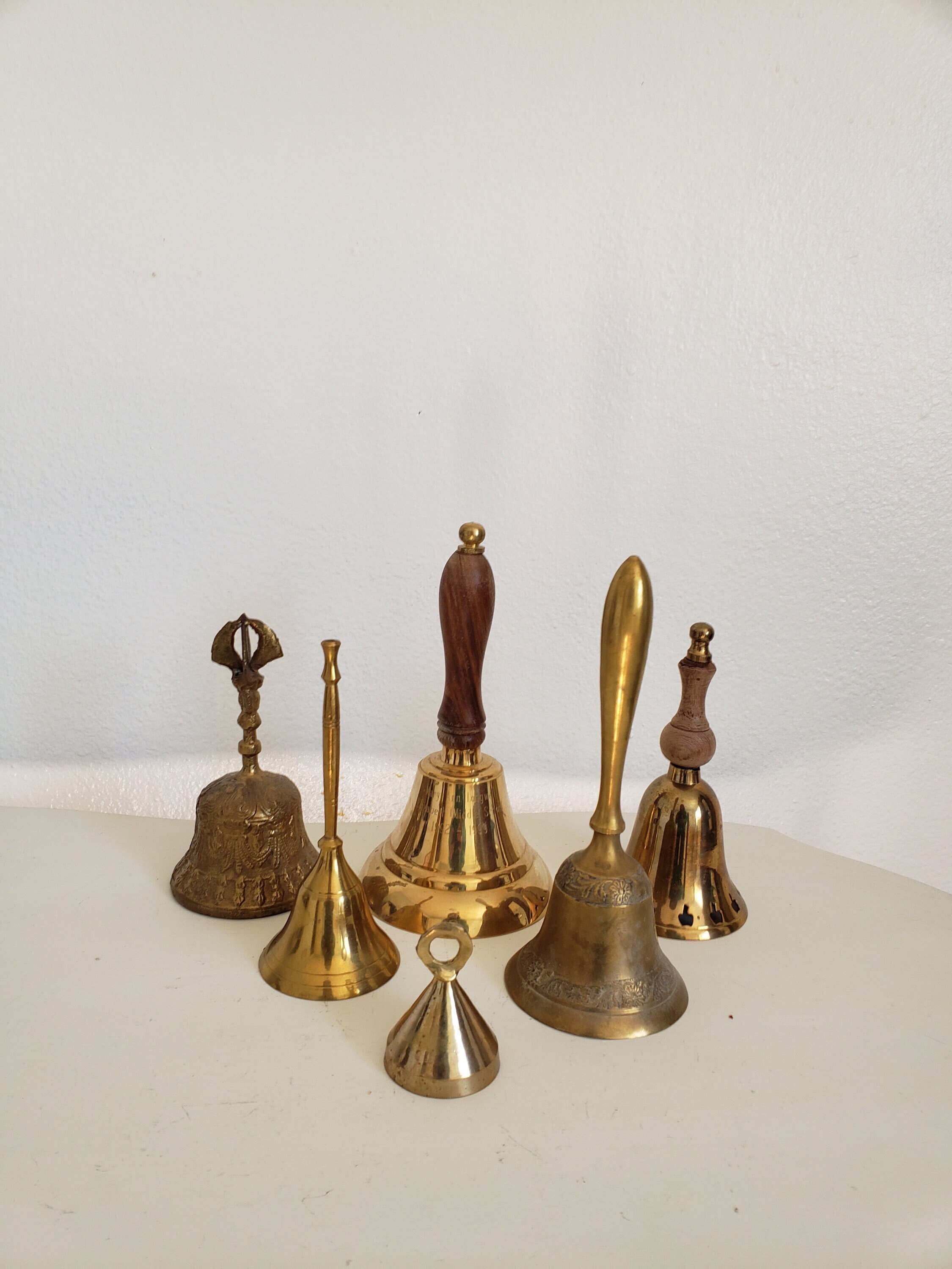 A good collection of mainly Victorian brass novelty items