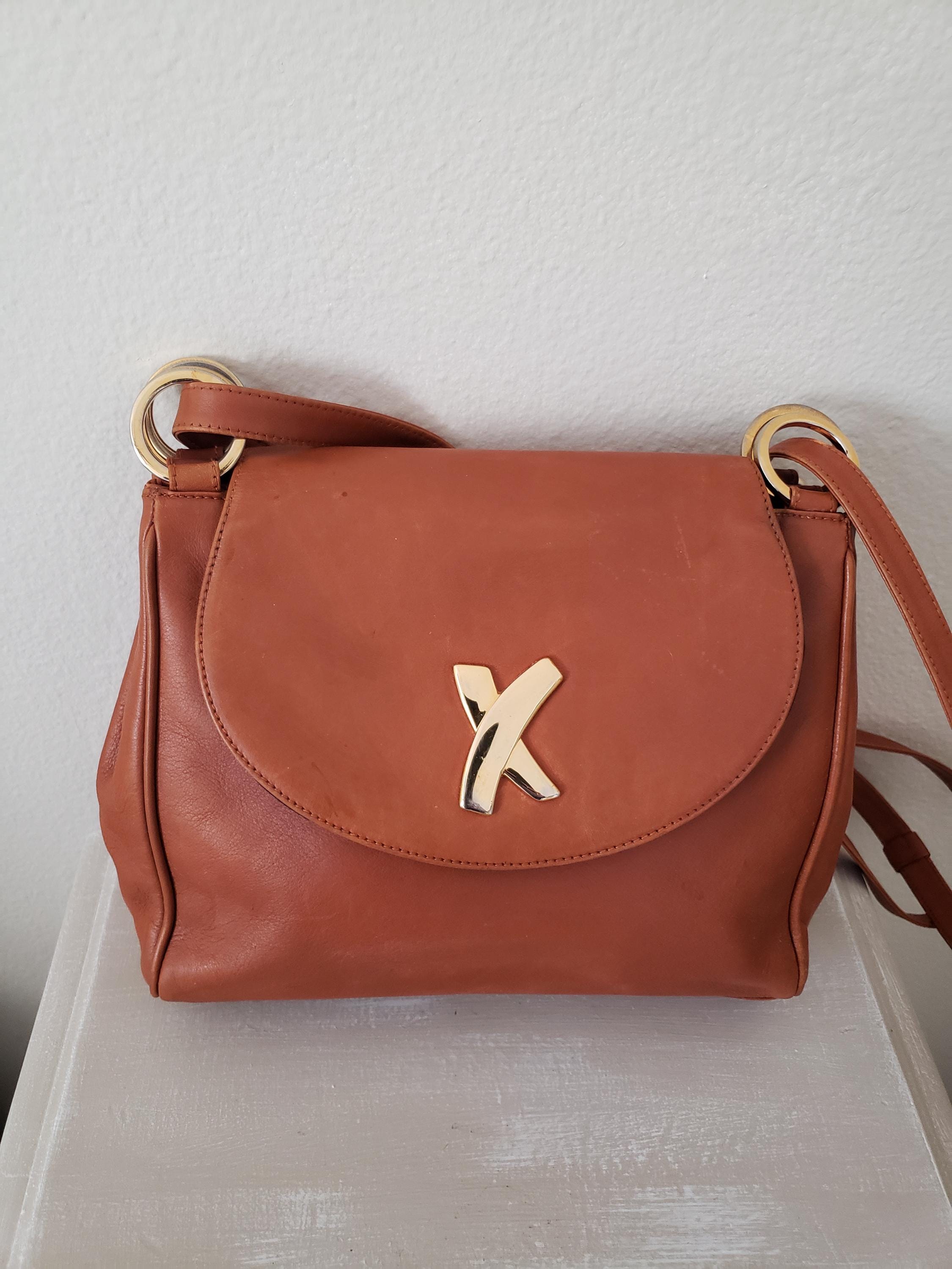Paloma Picasso ブラウン ショルダーバッグ Paloma Picasso Chestnut Leather Purse – OMNIA