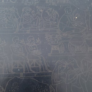 May include: A black book cover with gold lettering that reads "A History of Civilization". The cover features a detailed illustration of people in ancient Egyptian clothing.