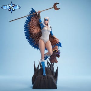 May include: A detailed figurine of a female character with blue and brown feathered wings, a white bodysuit, and blue boots, holding a staff with a crescent moon. A small brown creature stands nearby. The figurine is on a dark base against a light blue background.