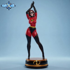 May include: A standing figurine of a character wearing a red and black bodysuit with a yellow logo on the chest, black gloves, and black boots. The character wears a black eye mask and stands on a circular black and gold base with a logo.