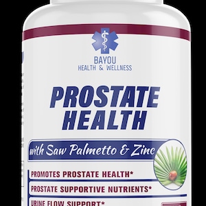 Pu&ograve; includere: Una bottiglia di integratore bianca con una fascia bordeaux e un tappo bianco. L'etichetta recita "PROSTATE HEALTH" con "with Saw Palmetto & Zinc". Indica anche "Promotes Prostate Health", "Prostate Supportive Nutrients" e "Urine Flow Support". La bottiglia contiene 60 capsule e fornisce una fornitura per 30 giorni.
