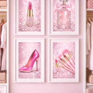 May include: Four framed prints with a pink theme. The prints feature a lipstick, perfume bottle, high heel, and makeup brushes. Each image is set against a sparkling, glittery background, with a pink colour scheme.