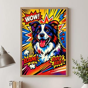 May include: Pop art style framed print featuring a colorful Border Collie dog with its tongue out. The artwork includes comic book style text bubbles with "WOW!", "BAM!", and "ARF! ARF!" in bold letters, set against a vibrant background.