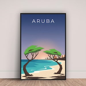 May include: Framed art print featuring a stylized Aruba beach scene. The artwork depicts a beach with turquoise water, a sandy shore, and two green-leafed trees. The word "ARUBA" is printed in white at the top, with a sunset and city skyline in the background.