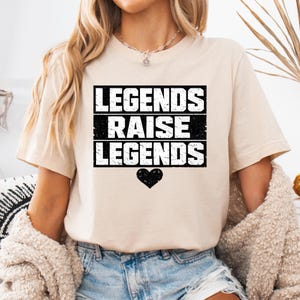 May include: A rustic wooden sign with the text "Welcome to our home" in white lettering. The sign features a distressed finish and a simple, inviting design, perfect for front door decor.