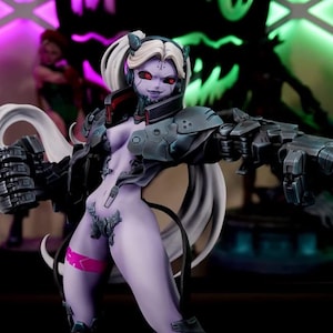 May include: A collectible figurine of a pale purple-skinned character with long white hair, red eyes, and mechanical armor pieces on the shoulders, arms, and legs. The character wears a dark jacket and stands on a circular base with a dark finish.