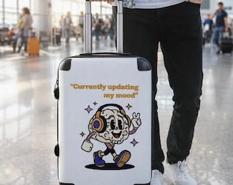 Zabawna walizka z napisem „Aktualnie aktualizuję swój nastrój”
