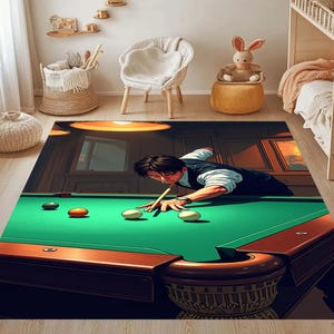 May include: A rectangular area rug featuring a vibrant illustration of a person playing pool. The rug has a green pool table with brown trim, white and colored billiard balls, and a person in a white shirt and black vest.