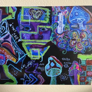May include: Colorful artwork on black background with a face, mushrooms, and text. The artwork features a face with purple and green outlines, mushrooms in blue, red, and purple, and the words "DON'T CRY" and "BACK 2 REALITY".