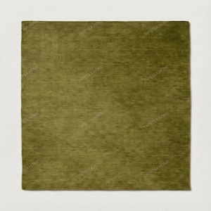 May include: A square, olive green rug with a soft, textured surface. The rug is set against a white background. The words "TAPETEX HOME" are repeated around the edges of the rug.